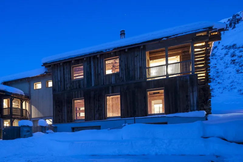 Chalet Shelley, a converted hay barn in Sertig at blue hour